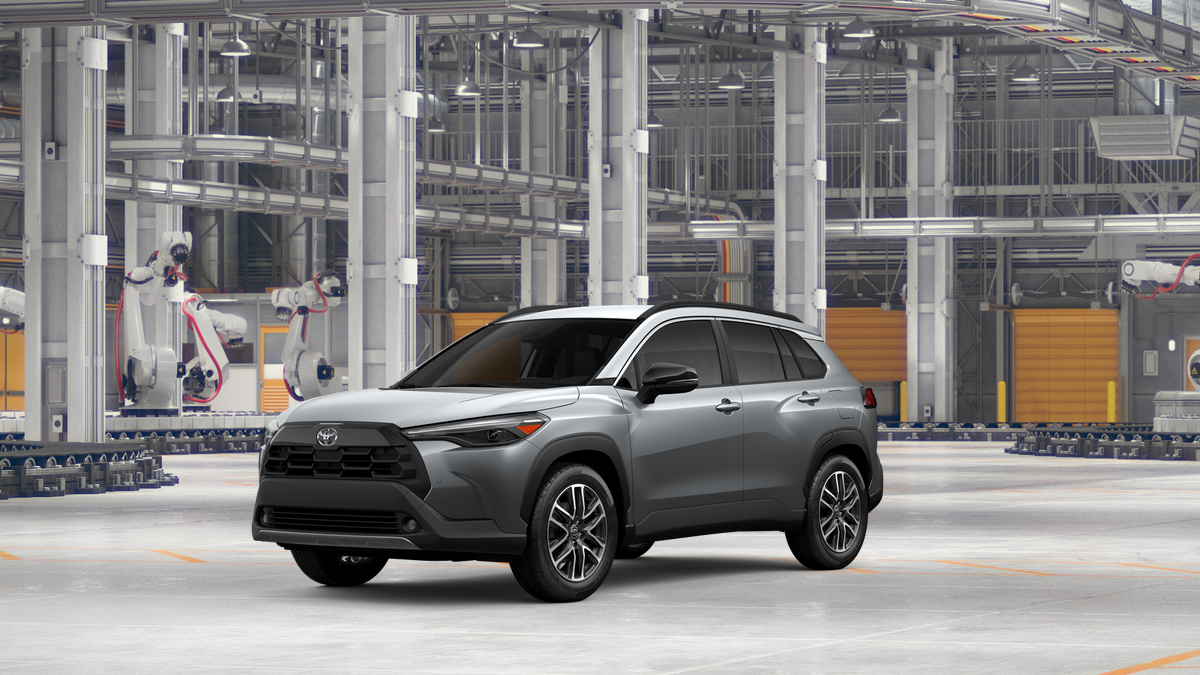 2026 Toyota Corolla Cross XLE in Sonic Silver — front three-quarter view